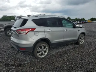 2013 Ford Escape Titanium with VIN 1FMCU9J94DUB00695, listed as a Copart auction lot 56633955 with 129,011 mi miles and Salvage title. Bid and sale history available at DreamBid. Image 3.