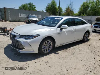 2021 Toyota Avalon Hybrid XLE z VIN 4T1AA1AB4MU007776, wystawiony jako Copart lot #52253255 z przebiegiem 134 390 mil mil oraz Szkoda całkowita • Salvage title. Historia ofert i sprzedaży dostępna na DreamBid. Obrazek 1.