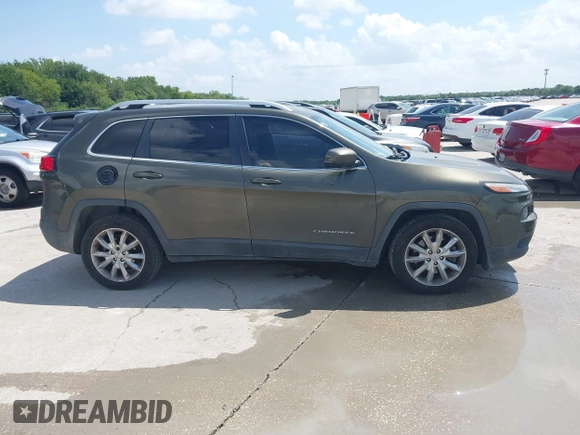 2016 Jeep Cherokee Limited z VIN 1C4PJLDB2GW136260, wystawiony jako IAAI lot #42751413 z przebiegiem 289 997 mil mil oraz . Historia ofert i sprzedaży dostępna na DreamBid. Obrazek 13.