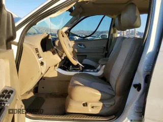 2005 Mercury Mariner Luxury z VIN 4M2CU56175DJ16949, wystawiony jako Copart lot #41901845 z przebiegiem 104 948 mil mil oraz Szkody całkowita. Historia ofert i sprzedaży dostępna na DreamBid. Obrazek 7.