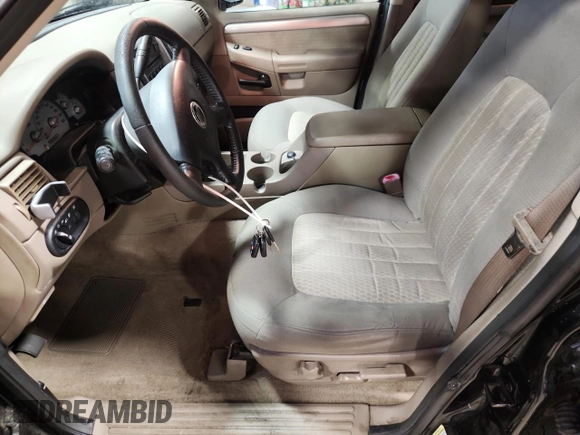 2004 Mercury Mountaineer Convenience with VIN 4M2ZU86W64UJ11988, listed as a Copart auction lot 63993715 with 94,682 mi miles and Salvage title. Bid and sale history available at DreamBid. Image 7.