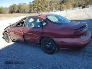 1998 Ford Taurus z VIN 1FAFP52S5WA261151, wystawiony jako Copart lot #83960754 z przebiegiem 135 049 mil mil oraz Szkoda całkowita • Salvage title. Historia ofert i sprzedaży dostępna na DreamBid. Obrazek 2.