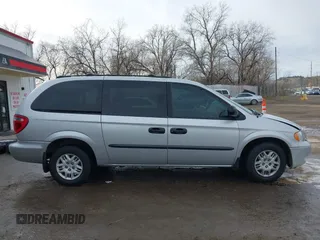 2004 Dodge Caravan SE with VIN 1D4GP24R14B562923, listed as a IAAI auction lot 41157893 with 169,040 mi miles. Bid and sale history available at carsss.com. Image 14.