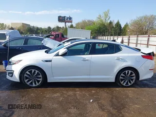 2015 Kia Optima SX Turbo with VIN 5XXGR4A65FG488237, listed as a IAAI auction lot 41978359 with 157,216 mi miles and . Bid and sale history available at DreamBid. Image 14.