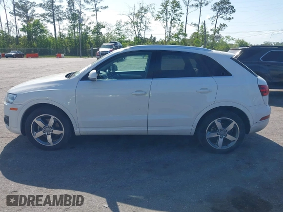 2015 Audi Q3 Premium Plus with VIN WA1EFCFS7FR010697, listed as a IAAI auction lot 41948566 with 167,001 mi miles and . Bid and sale history available at DreamBid. Image 14.