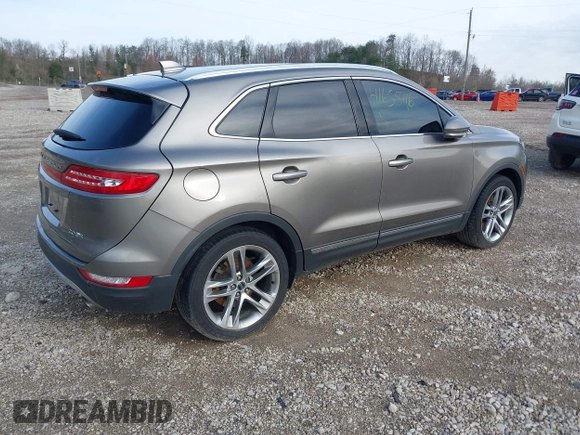 2016 Lincoln MKC Reserve with VIN 5LMCJ3D97GUJ31720, listed as a IAAI auction lot 41655116 with Not provided miles and . Bid and sale history available at DreamBid. Image 4.