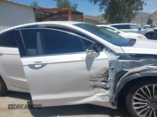 2017 Ford Fusion Titanium z VIN 3FA6P0SU0HR329224, wystawiony jako IAAI lot #42291605 z przebiegiem 176 728 mil mil oraz . Historia ofert i sprzedaży dostępna na DreamBid. Obrazek 19.