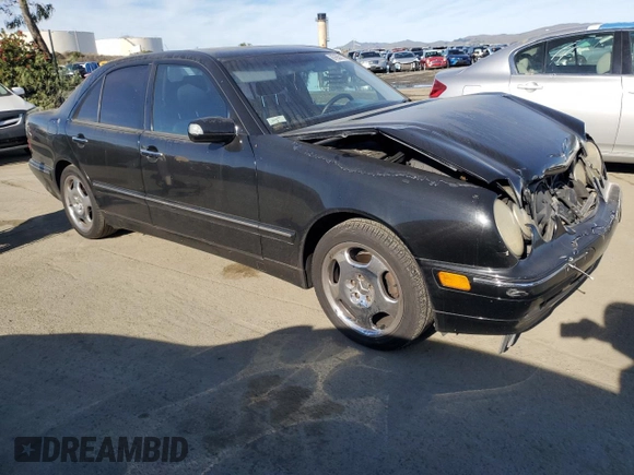 2001 Mercedes-Benz E-Class with VIN WDBJF70JX1B327997, listed as a Copart auction lot 87650175 with 268,045 mi miles and Salvage Title. Bid and sale history available at carsss.com. Image 4.