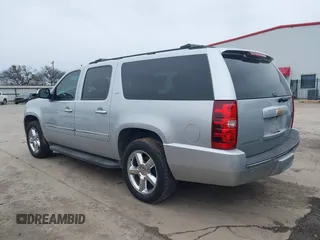 2013 Chevrolet Suburban LTZ with VIN 1GNSCKE02DR369777, listed as a IAAI auction lot 41565371 with 205,768 mi miles and . Bid and sale history available at DreamBid. Image 14.