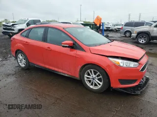 2015 Ford Focus SE with VIN 1FADP3F27FL356109, listed as a Copart auction lot 56828435 with 52,507 mi miles and Clean title. Bid and sale history available at DreamBid. Image 4.