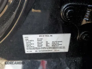 2024 Tesla Model Y Long Range z VIN 7SAYGAEE6RF106267, wystawiony jako Copart lot #53386675 z przebiegiem 8454 mil mil oraz Szkoda całkowita • Salvage title. Historia ofert i sprzedaży dostępna na DreamBid. Obrazek 13.