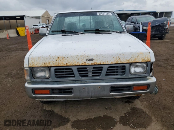 1997 Nissan Frontier XE with VIN 1N6SD16S8VC426940, listed as a Copart auction lot 55860235 with 242,265 mi miles and Salvage title. Bid and sale history available at DreamBid. Image 5.