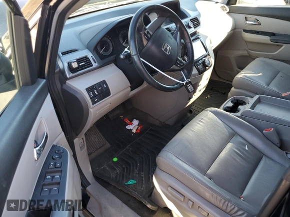 2014 Honda Odyssey EX-L with VIN 5FNRL5H69EB121140, listed as a Copart auction lot 79698724 with 169,626 mi miles and Salvage Title. Bid and sale history available at DreamBid. Image 8.