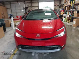 2024 Toyota Prius LE with VIN JTDACAAUXR3039886, listed as a IAAI auction lot 41928633 with 1,468 mi miles and . Bid and sale history available at DreamBid. Image 6.