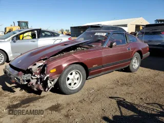 1982 Datsun 280ZX z VIN JN1HZ04S9CX450233, wystawiony jako Copart lot #88735675 z przebiegiem 137 235 mil mil oraz Tytuł czysty. Historia ofert i sprzedaży dostępna na DreamBid. Obrazek 1.