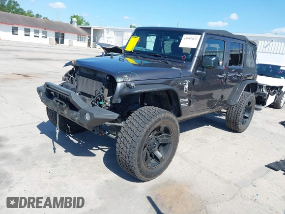 2014 Jeep Wrangler Unlimited Sport with VIN 1C4BJWDG4EL295044, listed as a IAAI auction lot 41997837 with 143,447 mi miles. Bid and sale history available at carsss.com. Image 2.