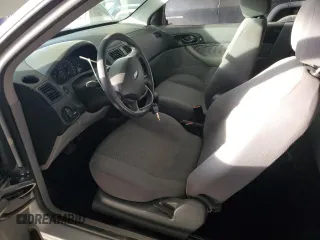 2007 Ford Focus S with VIN 1FAFP31N47W129857, listed as a Copart auction lot 51449645 with 146,360 mi miles and Salvage Title. Bid and sale history available at DreamBid. Image 7.