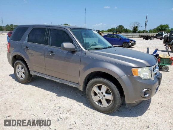 2009 Ford Escape XLS with VIN 1FMCU02739KC12318, listed as a Copart auction lot 61251485 with 179,335 mi miles and Salvage title. Bid and sale history available at DreamBid. Image 4.