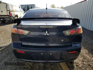 2014 Mitsubishi Lancer SE z VIN JA32V2FW2EU605184, wystawiony jako Copart lot #56007575 z przebiegiem 234 213 mil mil oraz Szkoda całkowita • Salvage title. Historia ofert i sprzedaży dostępna na DreamBid. Obrazek 6.
