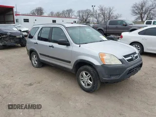 2002 Honda CR-V LX z VIN JHLRD78592C011636, wystawiony jako IAAI lot #41937049 z przebiegiem 207 491 mil mil oraz . Historia ofert i sprzedaży dostępna na DreamBid. Obrazek 1.