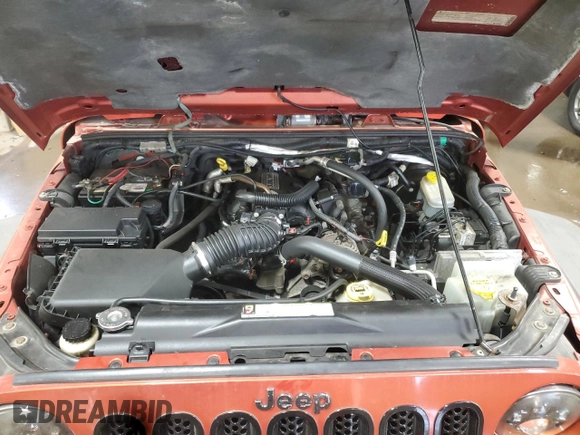 2009 Jeep Wrangler Rubicon with VIN 1J4GA64179L733136, listed as a Copart auction lot 43747805 with 94,899 mi miles and Salvage Title. Bid and sale history available at DreamBid. Image 11.
