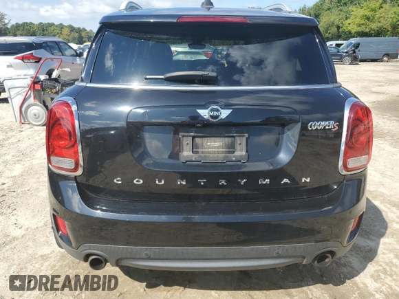 2017 MINI Countryman Cooper S with VIN WMZYT3C39H3D98677, listed as a Copart auction lot 71831944 with 56,638 mi miles and Salvage Title. Bid and sale history available at carsss.com. Image 6.