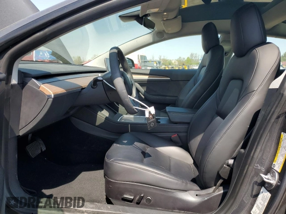 2023 Tesla Model 3 Long Range with VIN 5YJ3E1EB2PF389041, listed as a Copart auction lot 53450725 with 27,060 mi miles and Salvage Title. Bid and sale history available at DreamBid. Image 7.