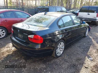 2006 BMW 3 Series 325i with VIN WBAVB13546KR57268, listed as a IAAI auction lot 42002464 with 210,663 mi miles. Bid and sale history available at carsss.com. Image 4.
