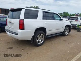 2020 Chevrolet Tahoe LT with VIN 1GNSCBKC4LR181887, listed as a IAAI auction lot 42160821 with 106,757 mi miles and . Bid and sale history available at DreamBid. Image 4.