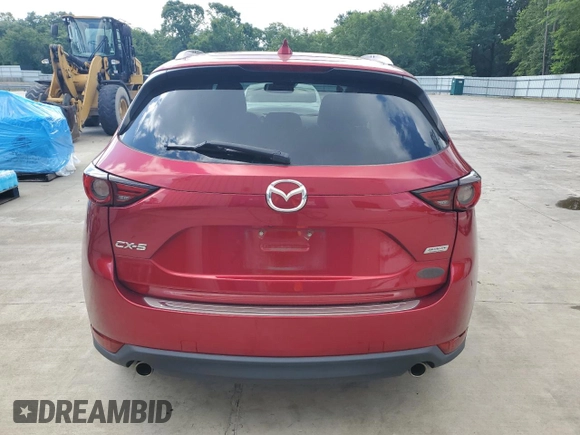 2019 Mazda CX-5 Grand Touring with VIN JM3KFADM2K1657915, listed as a Copart auction lot 56647145 with 85,095 mi miles and Salvage title. Bid and sale history available at DreamBid. Image 6.