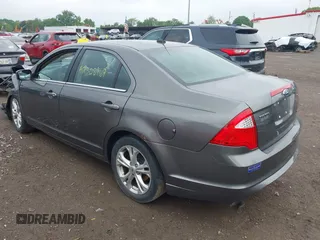 2012 Ford Fusion SE with VIN 3FAHP0HA4CR207481, listed as a IAAI auction lot 42308969 with 198,735 mi miles and . Bid and sale history available at DreamBid. Image 3.