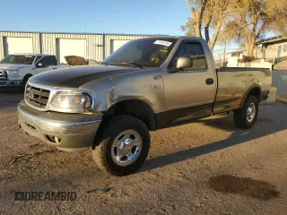 2002 Ford F-150 XL with VIN 1FTRF18262NB35586, listed as a Copart auction lot 77114114 with 166,942 mi miles and Salvage title. Bid and sale history available at DreamBid. Image 1.