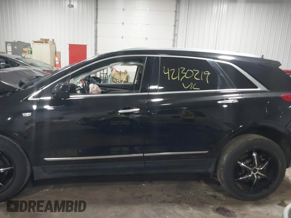 2018 Cadillac XT5 Premium Luxury FWD with VIN 1GYKNERS6JZ230175, listed as a IAAI auction lot 42130219 with 90,601 mi miles and . Bid and sale history available at DreamBid. Image 14.