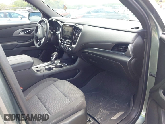 2023 Chevrolet Traverse LT Cloth z VIN 1GNERGKW6PJ110388, wystawiony jako IAAI lot #41922769 z przebiegiem 59 186 mil mil oraz . Historia ofert i sprzedaży dostępna na DreamBid. Obrazek 5.