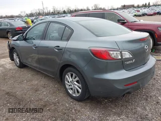 2012 Mazda Mazda3 i Touring with VIN JM1BL1V83C1542258, listed as a IAAI auction lot 41988625 with 94,911 mi miles. Bid and sale history available at carsss.com. Image 3.