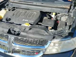 2012 Dodge Journey SXT z VIN 3C4PDDBG1CT342584, wystawiony jako IAAI lot #43156009 z przebiegiem 219 036 mil mil oraz . Historia ofert i sprzedaży dostępna na DreamBid. Obrazek 13.