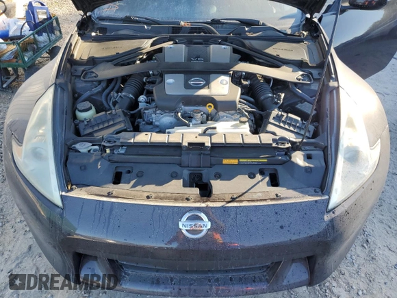 2010 Nissan 370Z Touring с VIN JN1AZ4FH0AM301069, выставлен на аукционе Copart как лот 82912404 с пробегом 55 803 миль миль и Списание • Salvage title. История ставок и продаж доступна на DreamBid. Изображение 11.