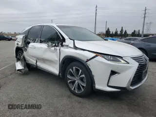 2019 Lexus RX 450h with VIN 2T2BGMCA4KC035015, listed as a Copart auction lot 50659345 with 84,408 mi miles and Salvage Title. Bid and sale history available at DreamBid. Image 4.