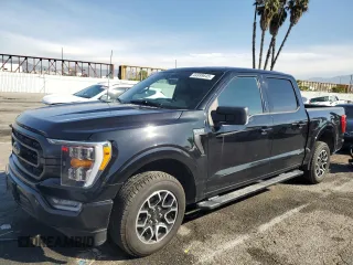 2021 Ford F-150 XL with VIN 1FTEW1CP8MFB87333, listed as a Copart auction lot 51970725 with 69,889 mi miles and Salvage Title. Bid and sale history available at carsss.com. Image 1.