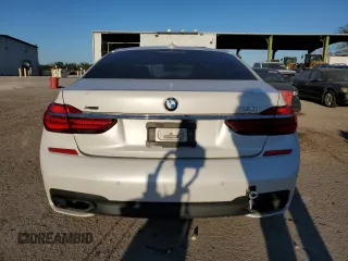 2016 BMW 7 Series 750i xDrive with VIN WBA7B0C59GG526741, listed as a Copart auction lot 86312384 with 90,360 mi miles and Salvage title. Bid and sale history available at DreamBid. Image 6.