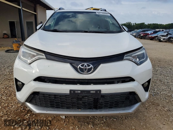 2016 Toyota RAV4 SE with VIN JTMJFREV5GD184074, listed as a Copart auction lot 60116955 with 182,240 mi miles and Salvage title. Bid and sale history available at DreamBid. Image 5.