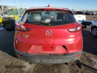 2018 Mazda CX-3 Grand Touring z VIN JM1DKFD75J0319224, wystawiony jako Copart lot #87504495 z przebiegiem 47 466 mil mil oraz Szkody całkowita. Historia ofert i sprzedaży dostępna na DreamBid. Obrazek 6.