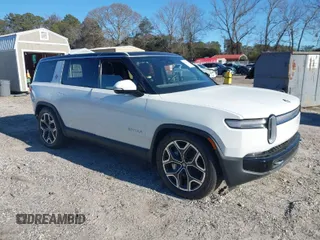 2025 Rivian R1S Adventure with VIN 7PDSGBBA0SN049154, listed as a IAAI auction lot 41160166 with 3,036 mi miles. Bid and sale history available at carsss.com. Image 1.
