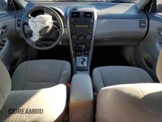 2010 Toyota Corolla z VIN 1NXBU4EE0AZ289475, wystawiony jako Copart lot #43056795 z przebiegiem 183 995 mil mil oraz Szkoda całkowita • Salvage title. Historia ofert i sprzedaży dostępna na DreamBid. Obrazek 8.