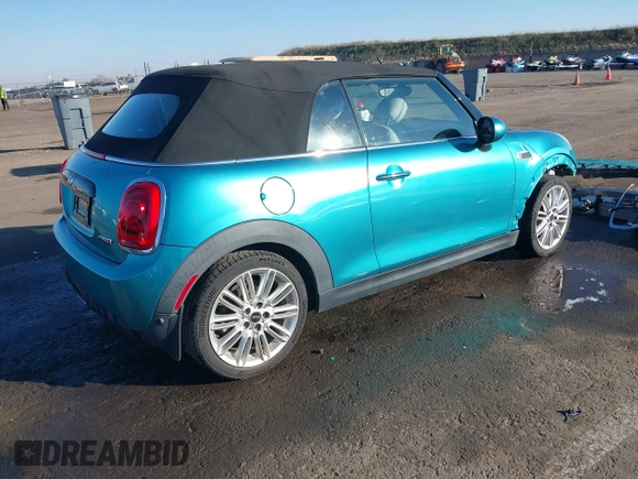2016 MINI Convertible z VIN WMWWG5C50G3C19656, wystawiony jako IAAI lot #41429611 z przebiegiem 60 873 mil mil oraz . Historia ofert i sprzedaży dostępna na DreamBid. Obrazek 4.