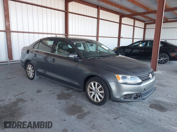 2013 Volkswagen Jetta SE z VIN 3VWDX7AJ3DM254962, wystawiony jako IAAI lot #41753707 z przebiegiem 125 225 mil mil oraz . Historia ofert i sprzedaży dostępna na DreamBid. Obrazek 1.