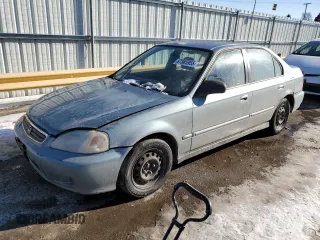2000 Honda Civic VP with VIN 2HGEJ6617YH605468, listed as a Copart auction lot 87885955 with 243,779 mi miles and Salvage Title. Bid and sale history available at carsss.com. Image 1.