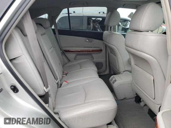 2007 Lexus RX 350 z VIN 2T2HK31U37C044795, wystawiony jako Copart lot #59156565 z przebiegiem 223 845 mil mil oraz Czysty tytuł • Clean title. Historia ofert i sprzedaży dostępna na DreamBid. Obrazek 11.