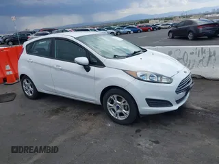 2015 Ford Fiesta SE z VIN 3FADP4EJ8FM141965, wystawiony jako IAAI lot #42427715 z przebiegiem 49 595 mil mil oraz . Historia ofert i sprzedaży dostępna na DreamBid. Obrazek 1.