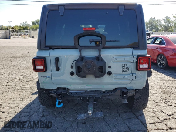 2024 Jeep Wrangler Sport S with VIN 1C4RJXN63RW142251, listed as a Copart auction lot 57103095 with 30,111 mi miles and Salvage title. Bid and sale history available at DreamBid. Image 6.